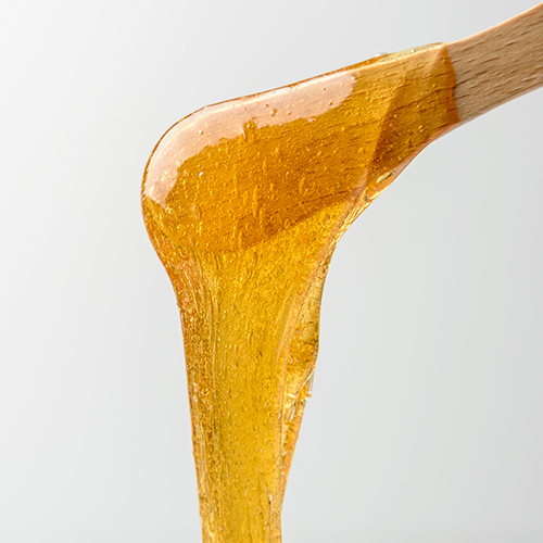 liquid-sugar-wax-on-spatula-2021-09-02-12-43-20-utc.jpg